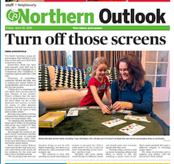 Mother and daughter play a game during screen free week